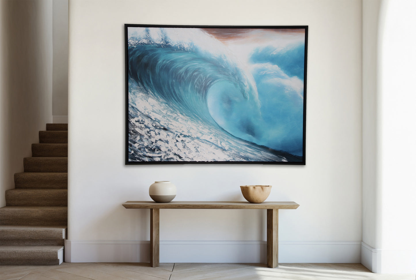 "Barrel of Light" painting displayed in a modern hallway, showcasing its vibrant ocean hues and dynamic wave design as a centerpiece of coastal decor.